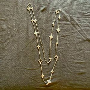 Faux gold long necklace approx 18-20 inches.